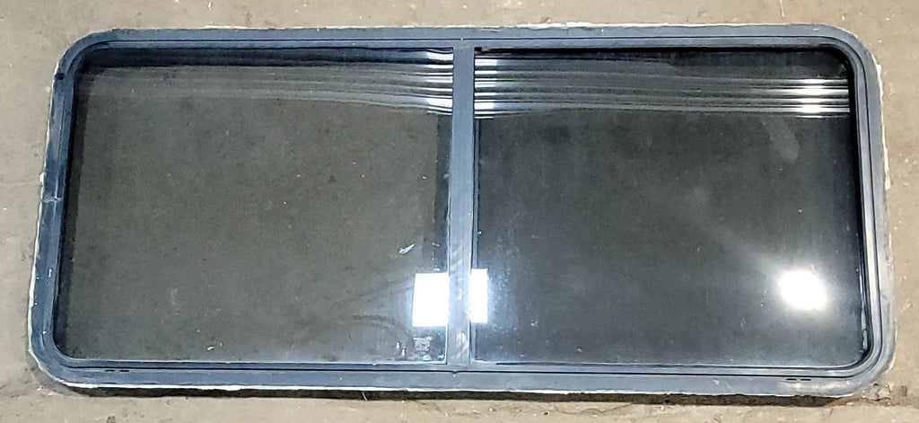 Used Black Radius Opening Window : 60" W x  25 3/4" H x 2" D - Young Farts RV Parts