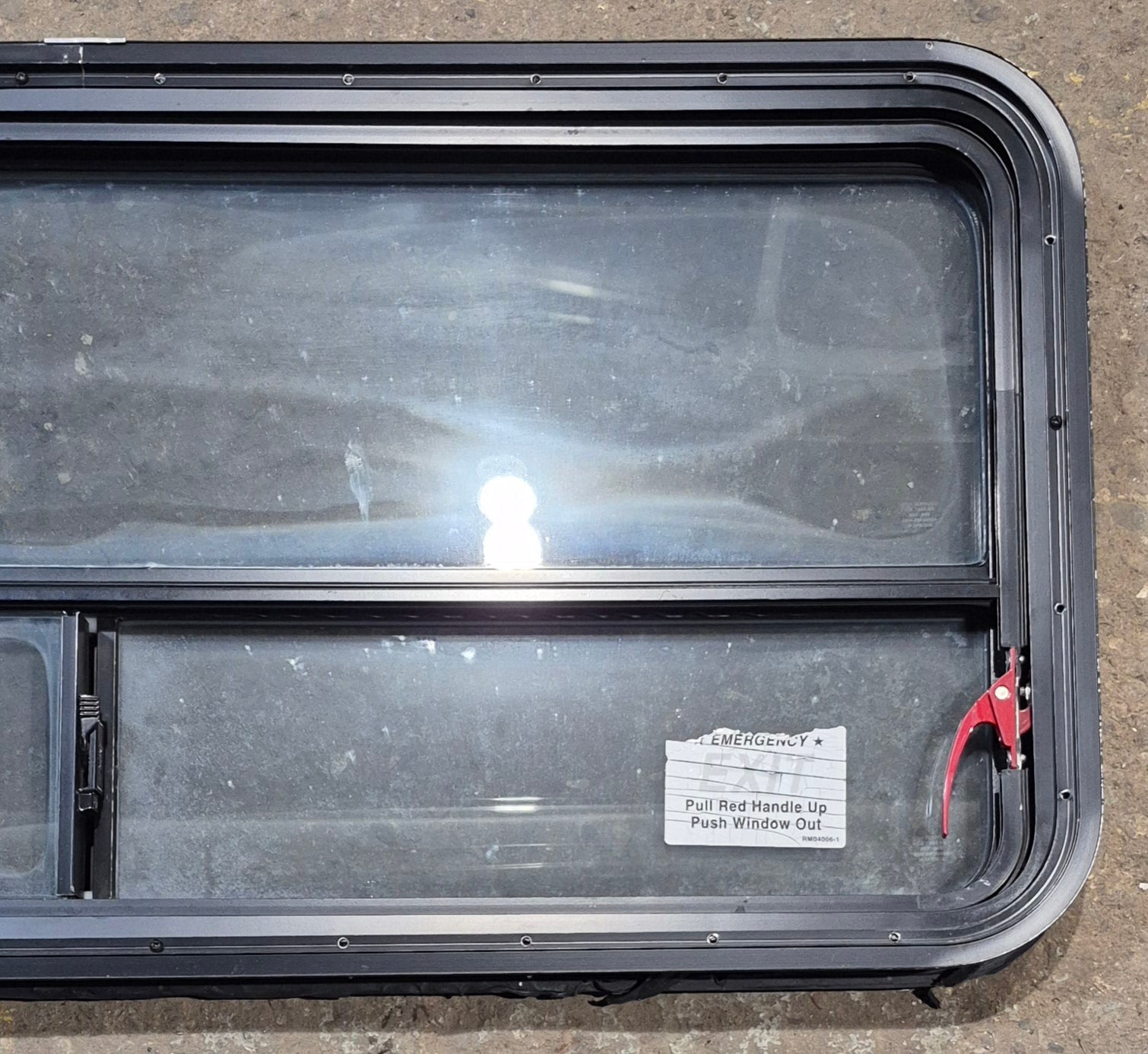 Used Black Radius Emergency Opening Window : 47 1/4" W x 21 1/4" H x 1 3/4" D - Young Farts RV Parts