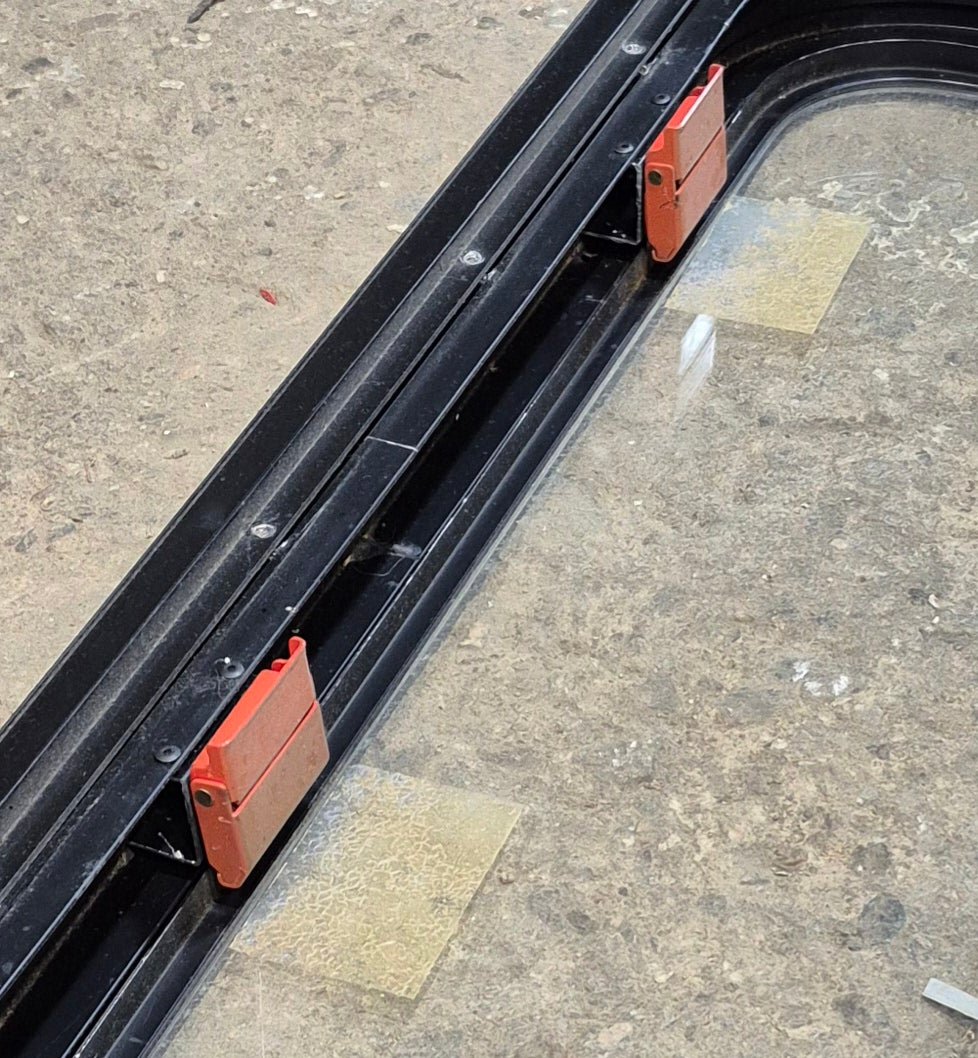 Used Black Radius Emergency Opening Window : 47 1/4" W x 21 1/4" H x 1 7/8" - Young Farts RV Parts