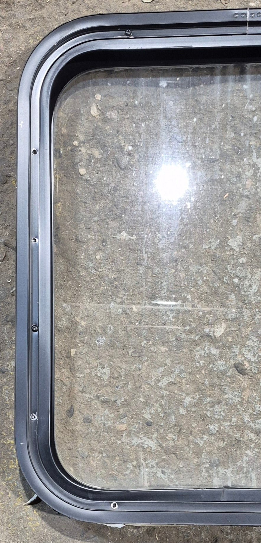 Used Black Radius Non Opening Window : 17 1/2" W x 21 1/4" H x 1 7/8" - Young Farts RV Parts