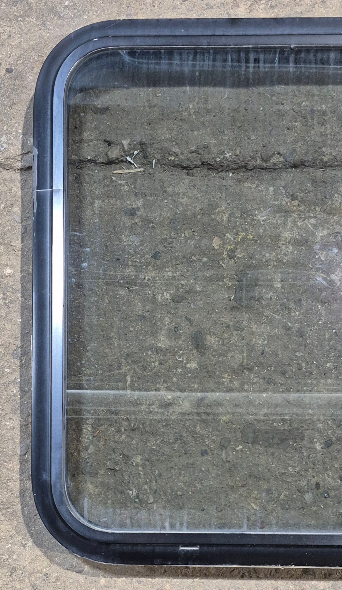 Used Black Radius Non Opening Window : 23 3/4" W x 26" H x 2" D - Young Farts RV Parts