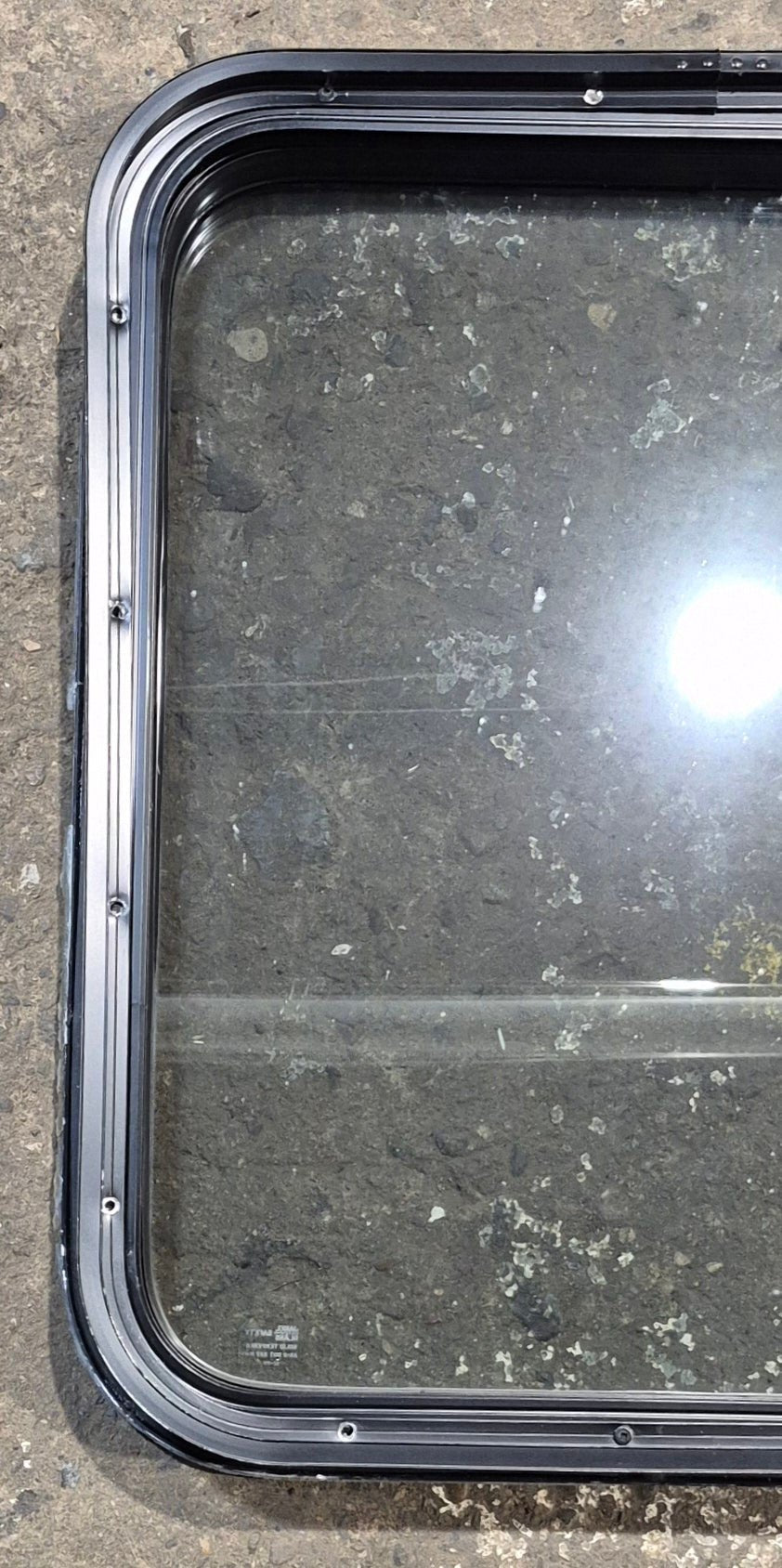 Used Black Radius Non Opening Window : 23 3/4" W x 26" H x 2" D - Young Farts RV Parts