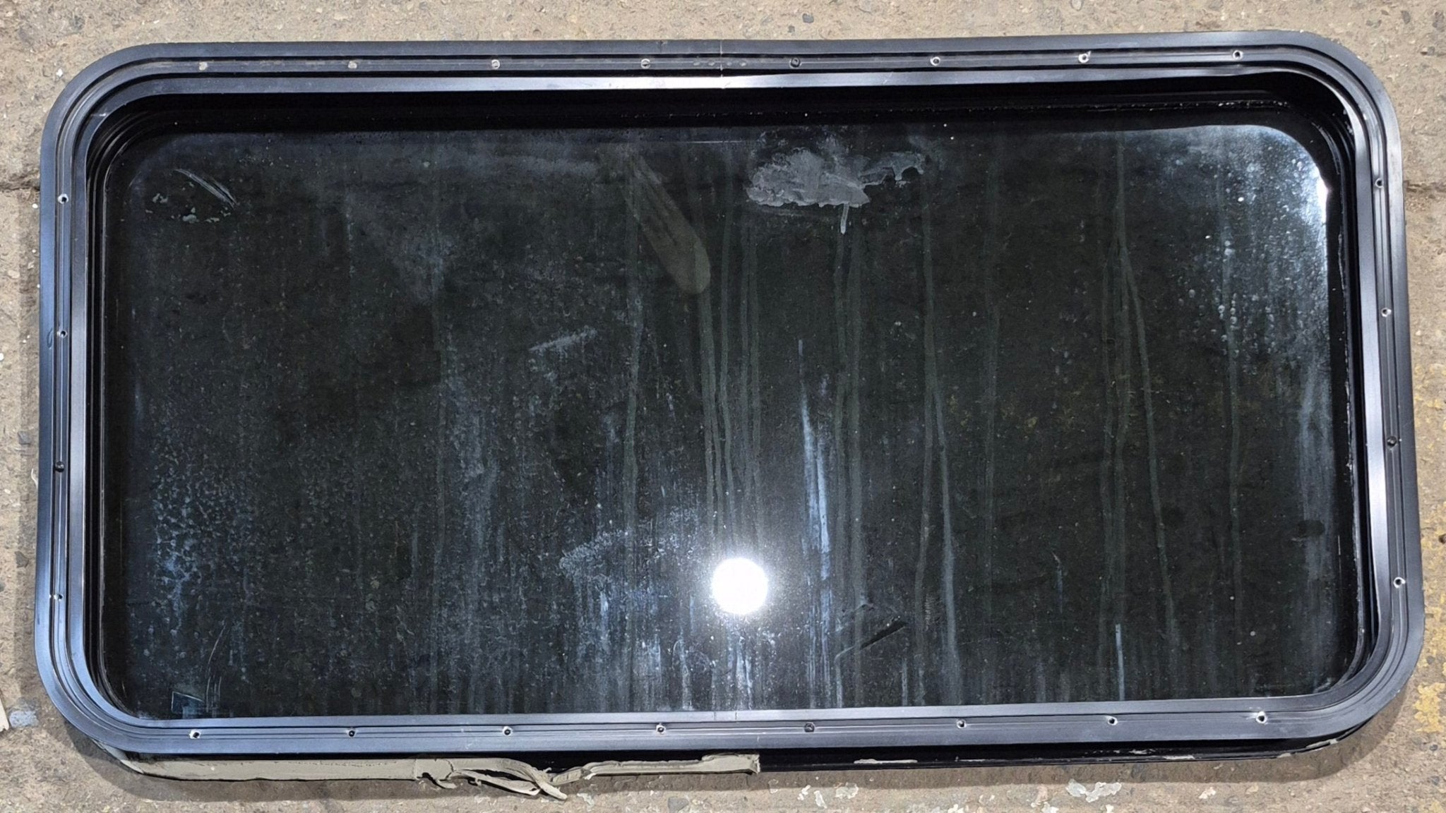 Used Black Radius Non Opening Window : 41 1/4" W x 21 1/4" H x 2" - Young Farts RV Parts