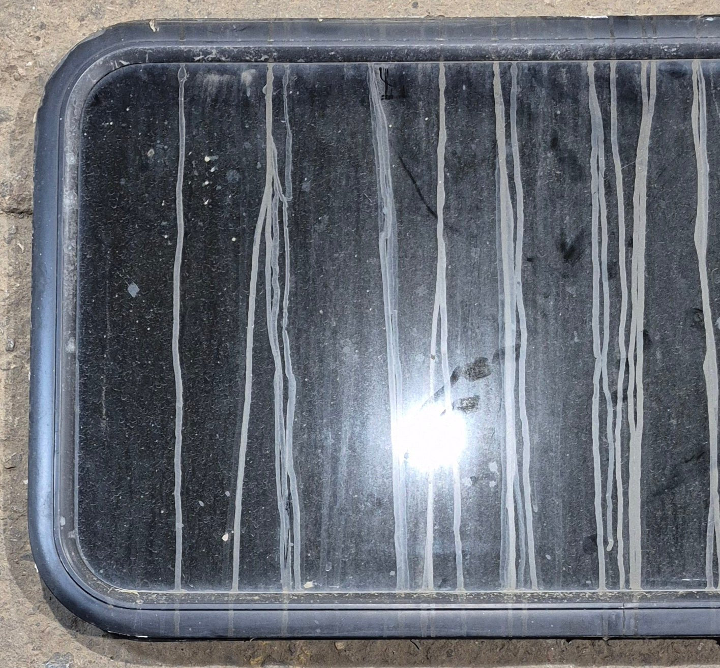 Used Black Radius Non Opening Window : 41 1/4" W x 21 1/4" H x 2" - Young Farts RV Parts