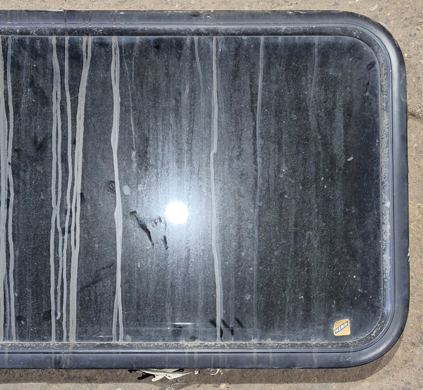 Used Black Radius Non Opening Window : 41 1/4" W x 21 1/4" H x 2" - Young Farts RV Parts
