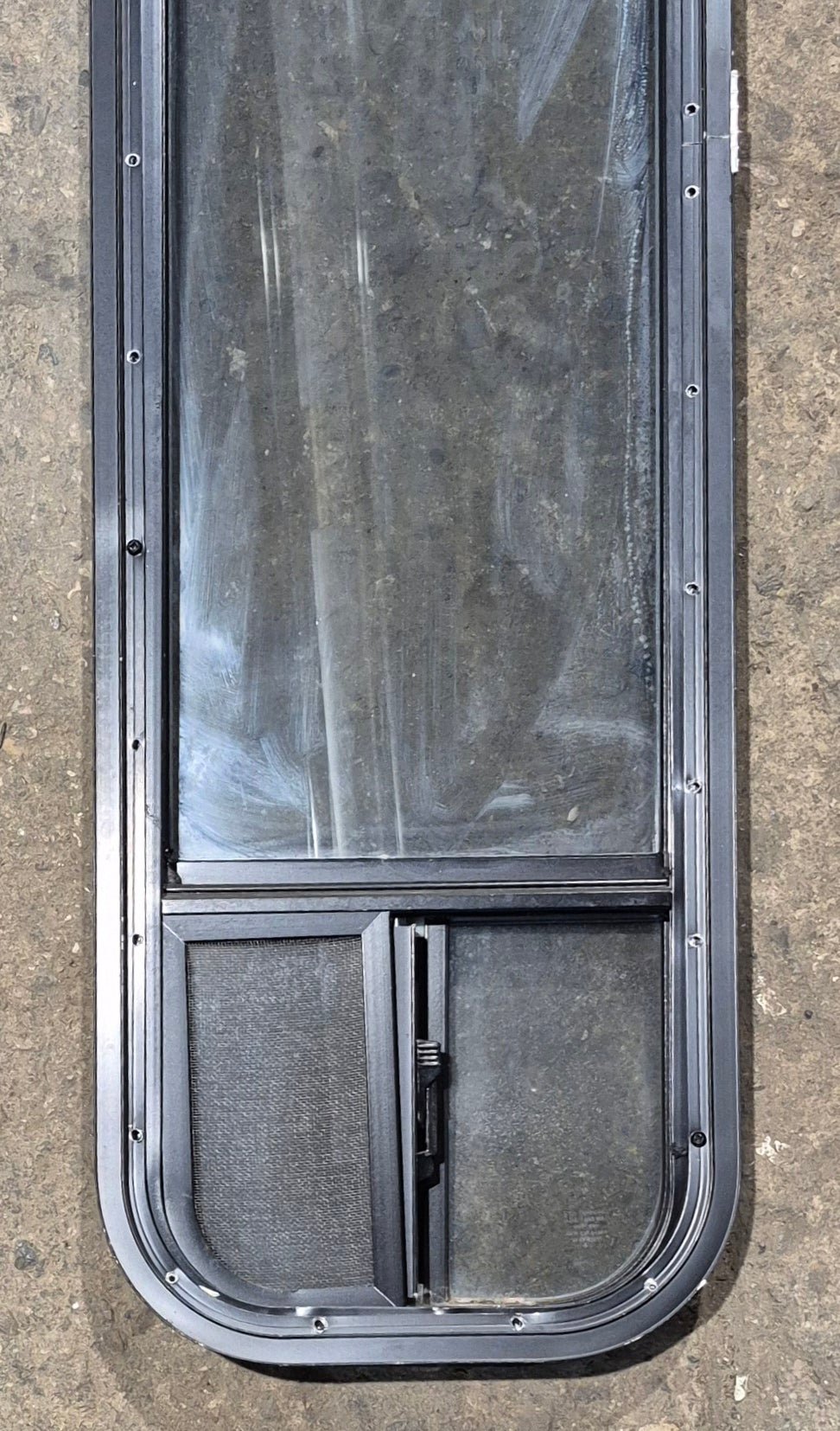 Used Black Radius Opening Window : 11 1/4" W x 47 1/4" H x 1 3/4" D - Young Farts RV Parts