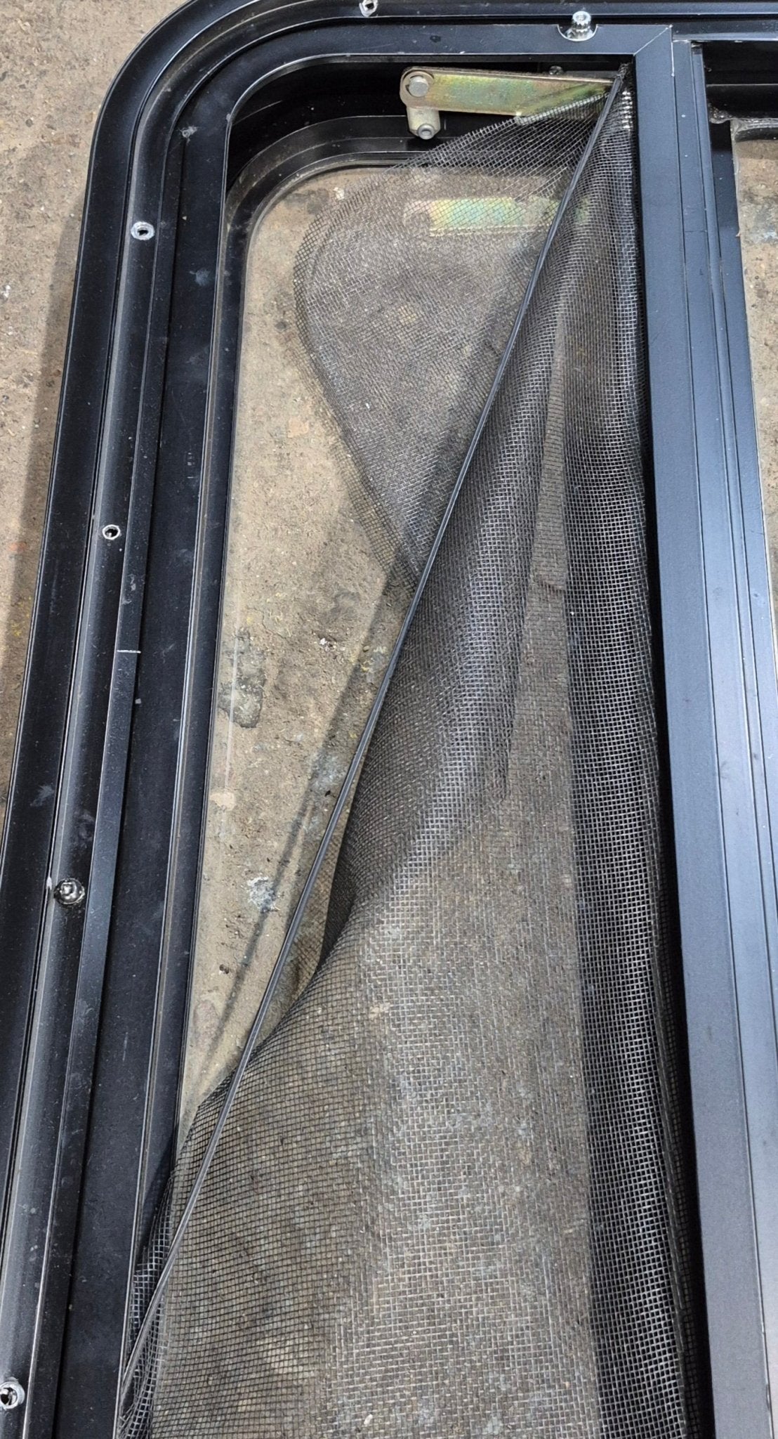 Used Black Radius Opening Window : 23 1/2" W x 14 1/4" H x 1 7/8" - Young Farts RV Parts