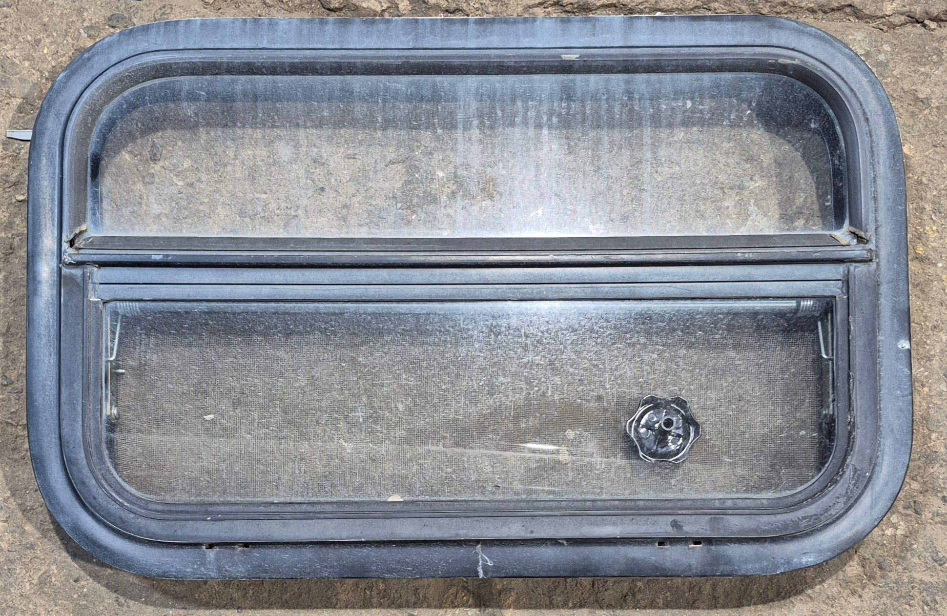 Used Black Radius Opening Window : 23 1/2" W x 14 1/4" H x 1 7/8" - Young Farts RV Parts