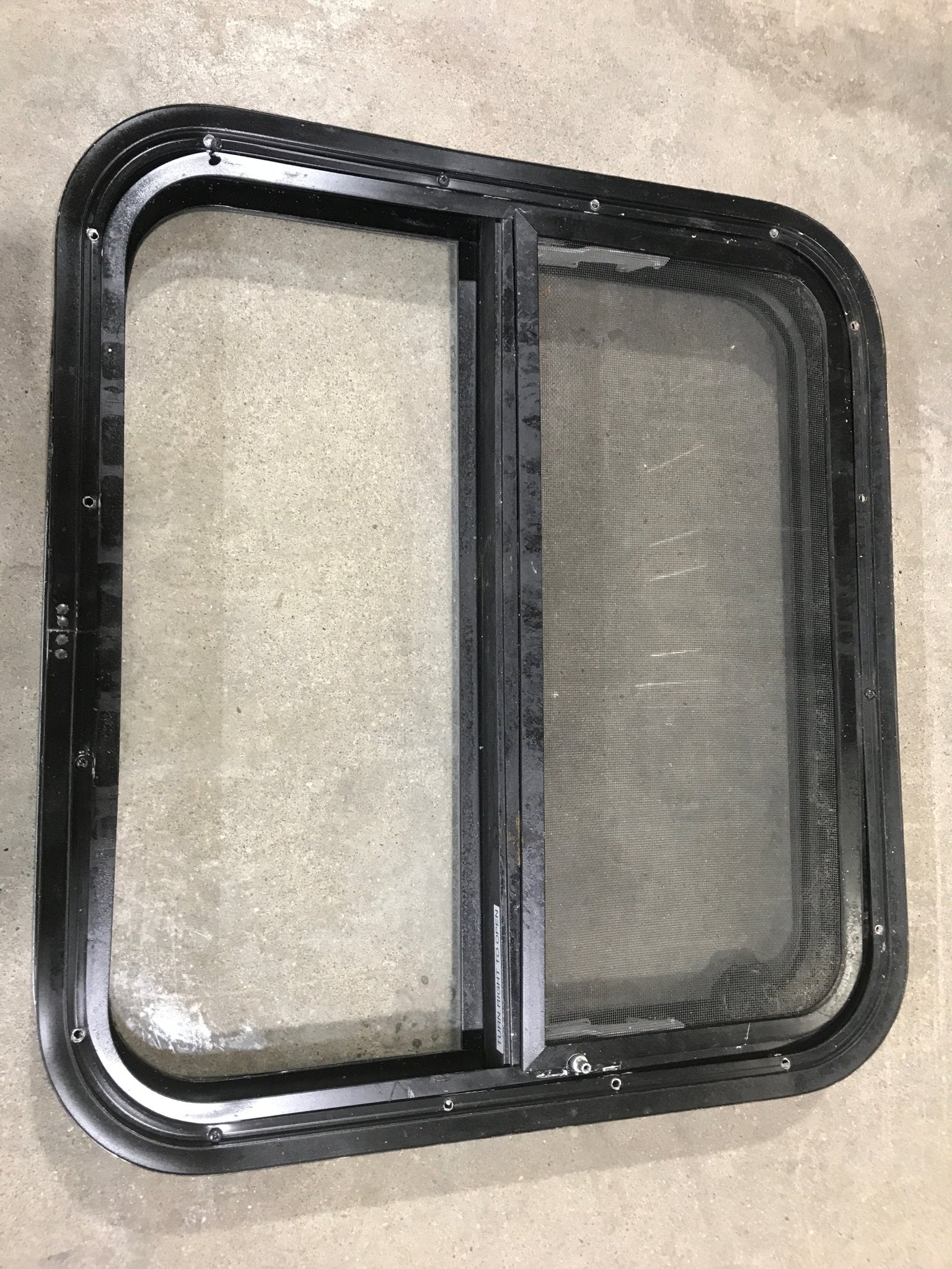 Used Black Radius Opening Window : 23 1/2" W X 21 1/4" H X 2" D - Young Farts RV Parts