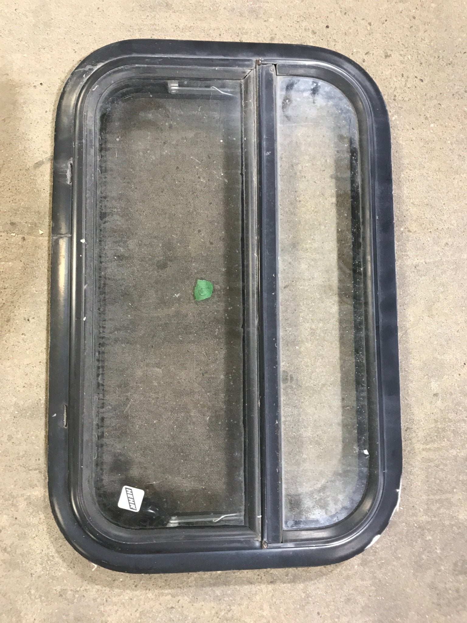 Used Black Radius Opening Window : 23 1/4" W X 14 1/2" H X 2" D - Young Farts RV Parts