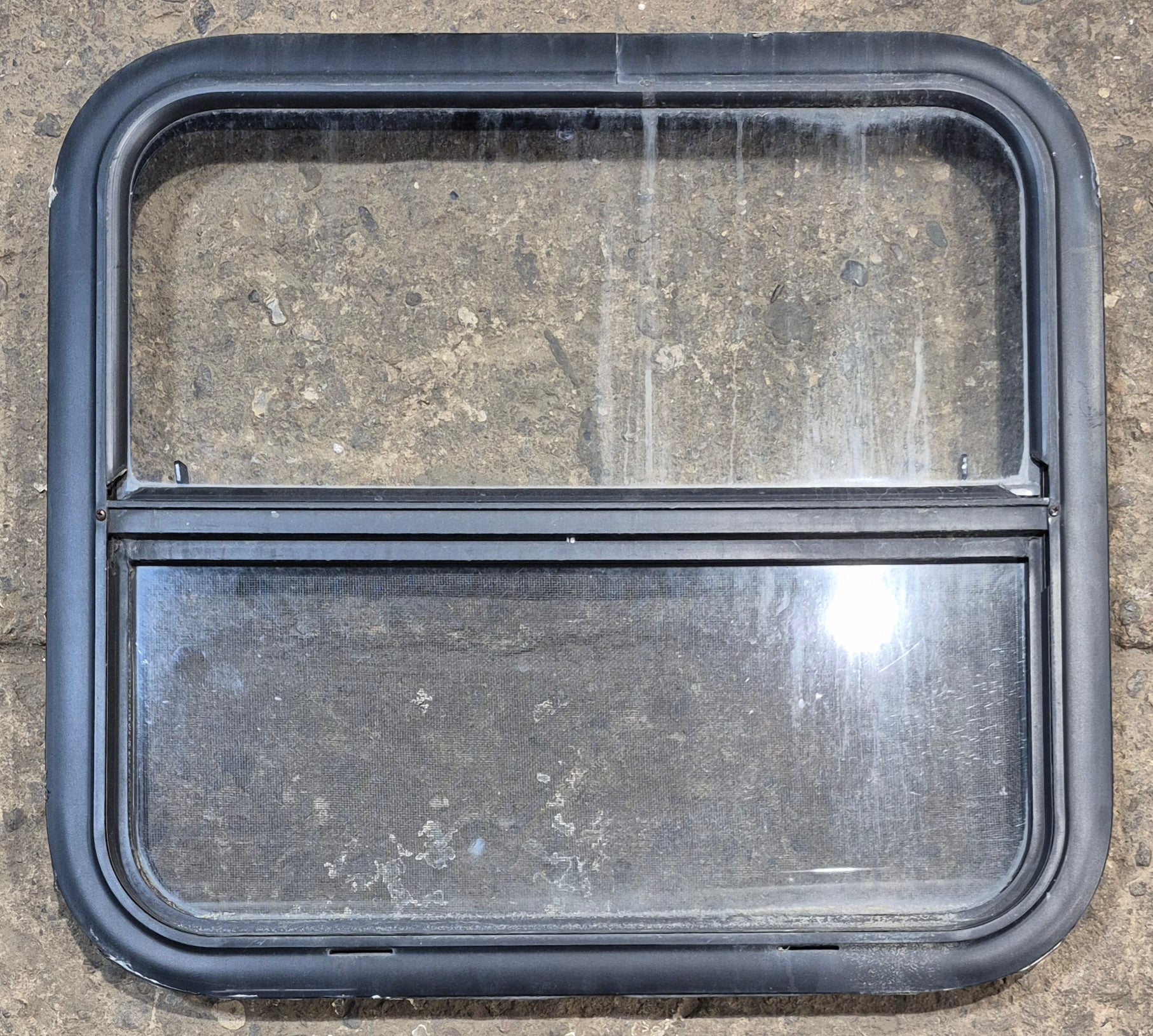 Used Black Radius Opening Window : 23 1/4" W x 21 1/4" H x 1 1/2" - Young Farts RV Parts