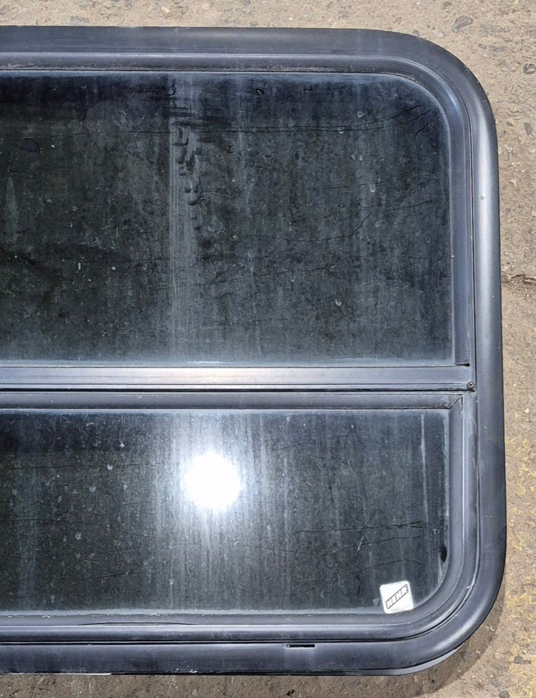 Used Black Radius Opening Window : 29 1/4" W x 21 1/4" H x 2" - Young Farts RV Parts