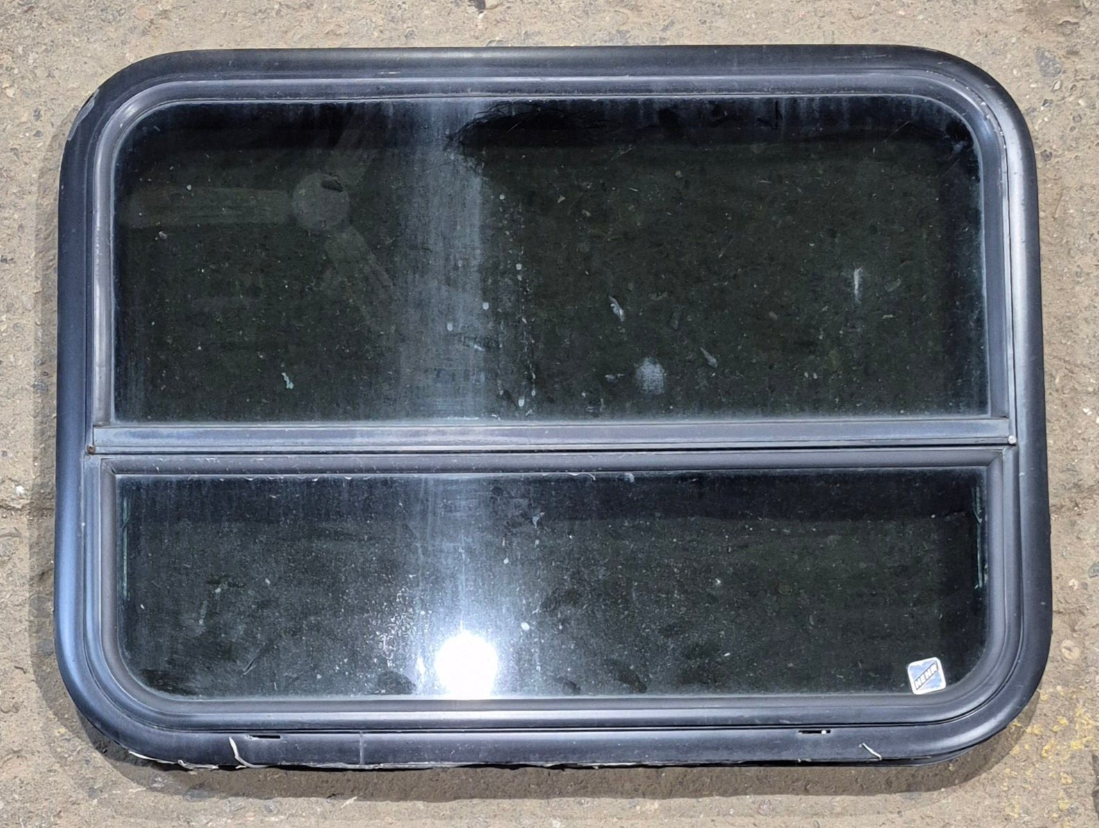 Used Black Radius Opening Window : 29 1/4" W x 21 1/4" H x 2" - Young Farts RV Parts