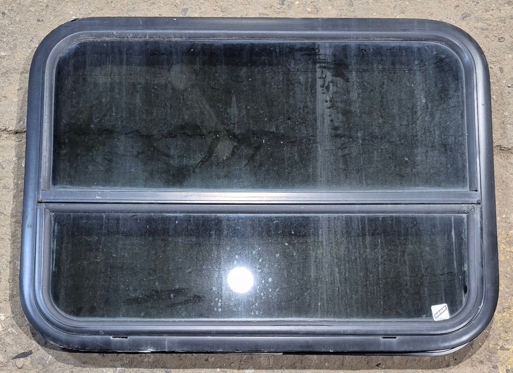 Used Black Radius Opening Window : 29 1/4" W x 21 1/4" H x 2" - Young Farts RV Parts