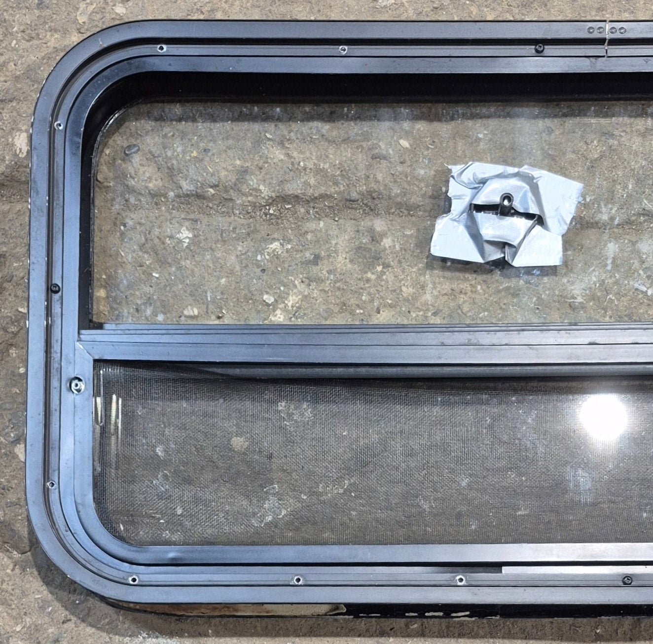 Used Black Radius Opening Window : 35 1/2" W x 17 1/4" H x 1 7/8" - Young Farts RV Parts