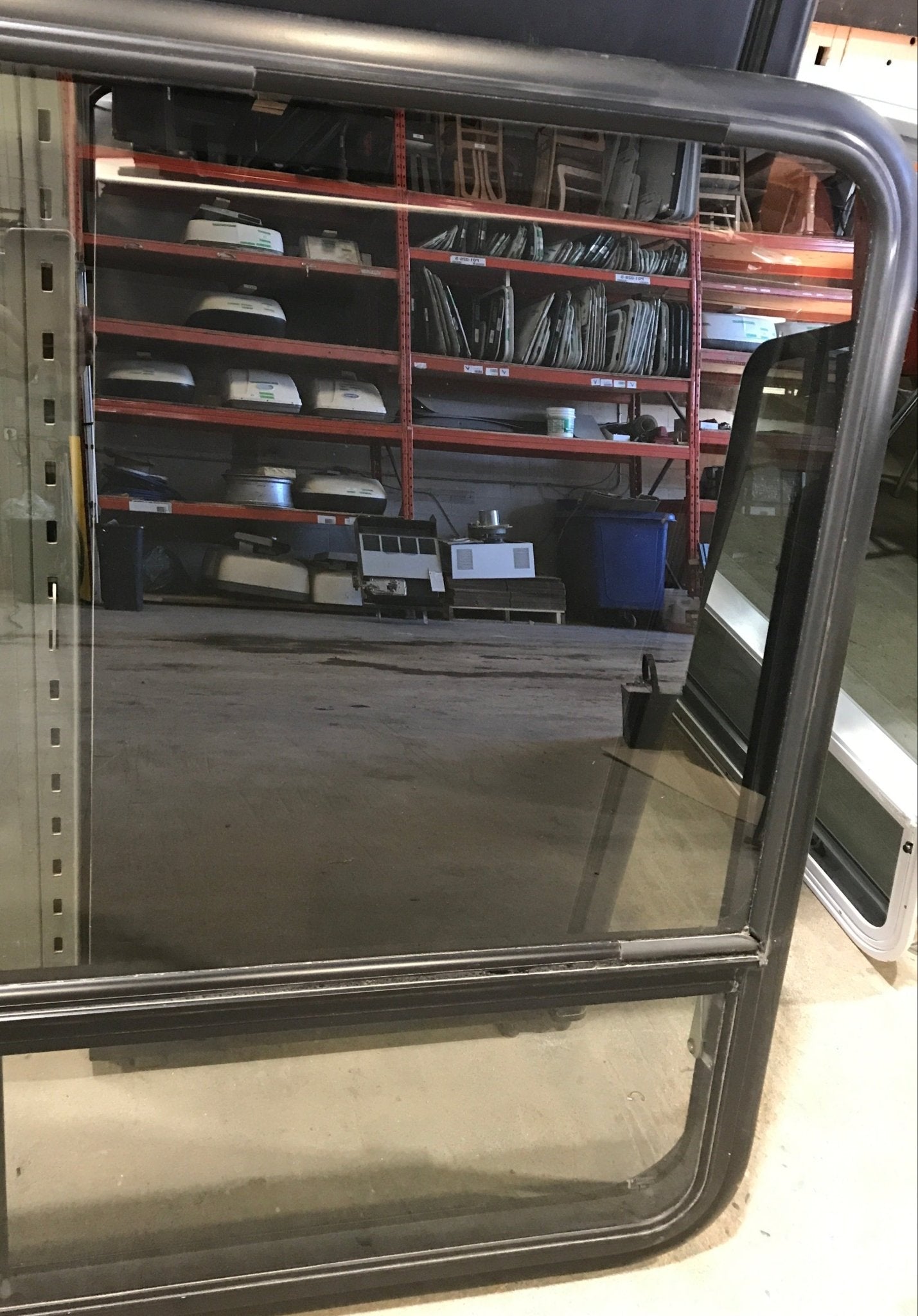 Used Black Radius Opening Window : 47 1/2" W x 29 1/2" H x 2" D - Young Farts RV Parts