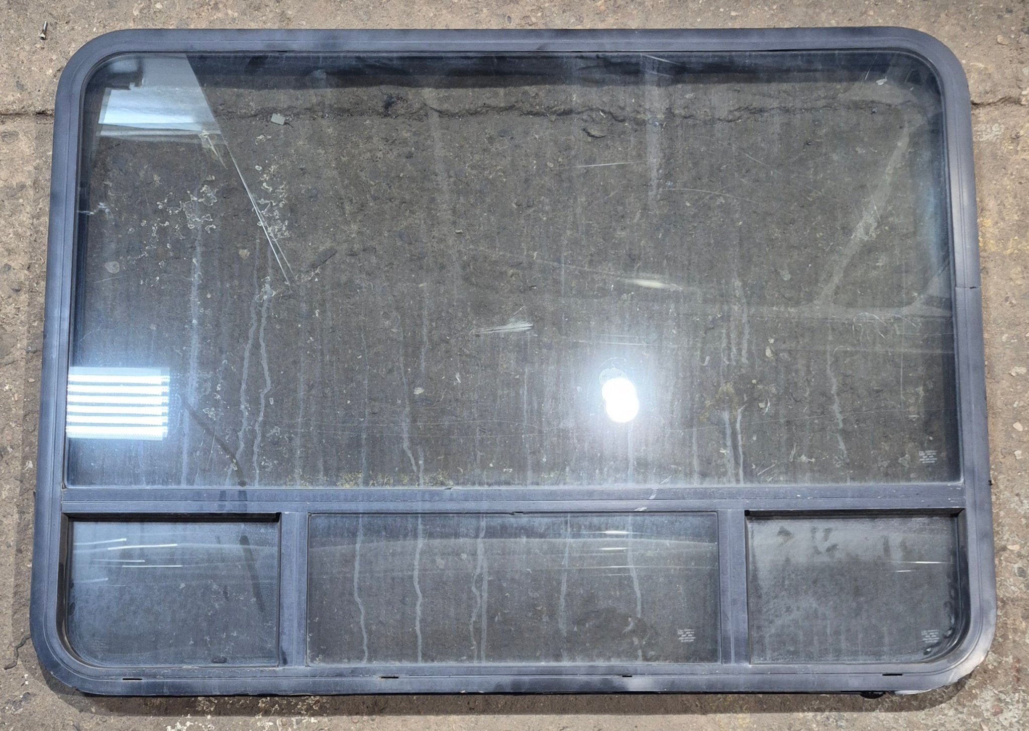 Used Black Radius Opening Window : 47 1/4" W x 34 1/4" H x 1 3/4" D - Young Farts RV Parts