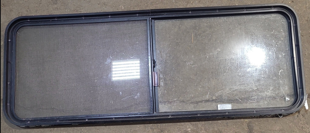Used Black Radius Opening Window : 60 1/4" W x 21 3/4" H x 1 3/4" D - Young Farts RV Parts