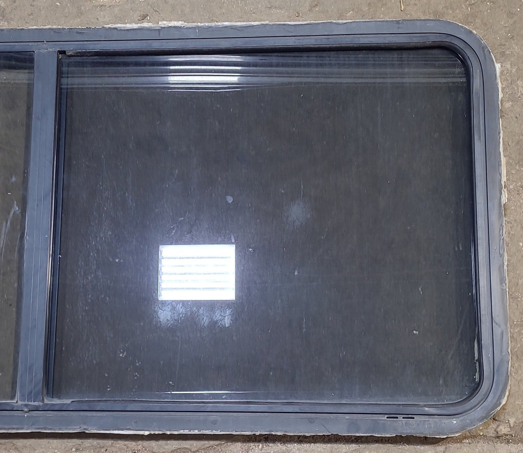 Used Black Radius Opening Window : 60" W x 25 3/4" H x 2" D - Young Farts RV Parts