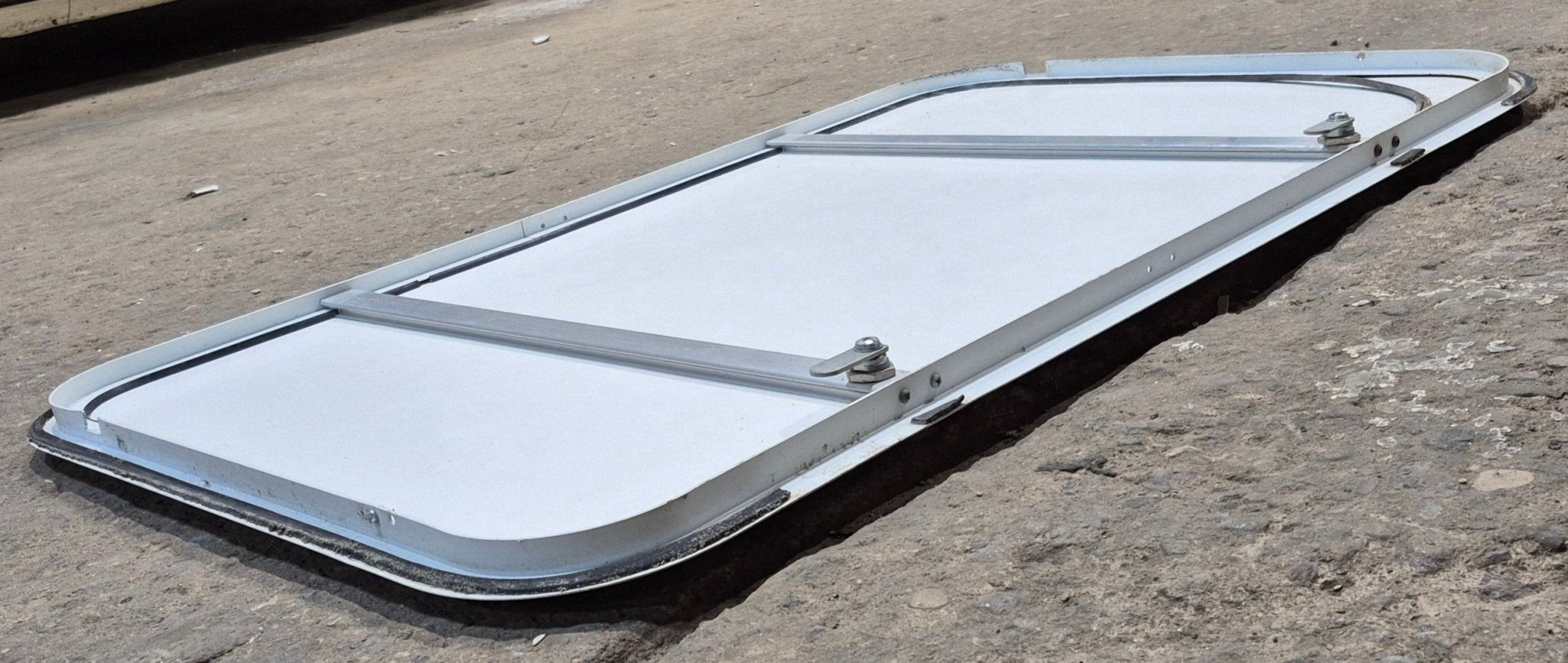 Used Radius Opening Rock Guard Cover : 36" x 22 1/8" x 5/8" D - Young Farts RV Parts