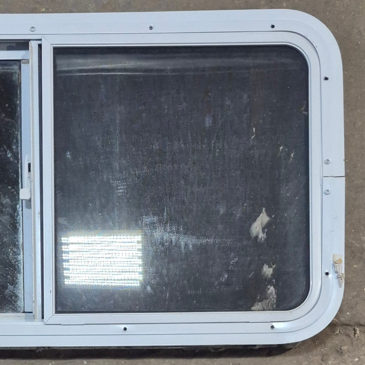 Used Slanted White Radius Opening Window : 42" W x 17 1/2" H x 1 7/8" D - Young Farts RV Parts
