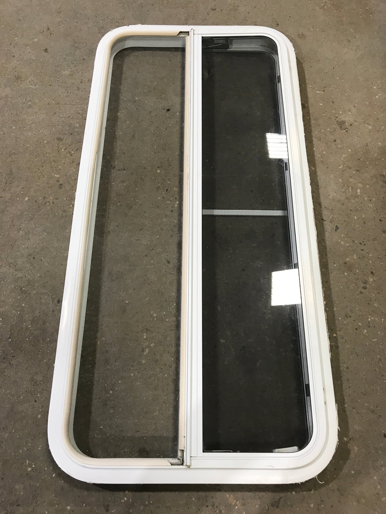 Used White Radius Emergency Opening Window : 47 1/2" W x 21 1/2" H x 1 1/2" D - Young Farts RV Parts