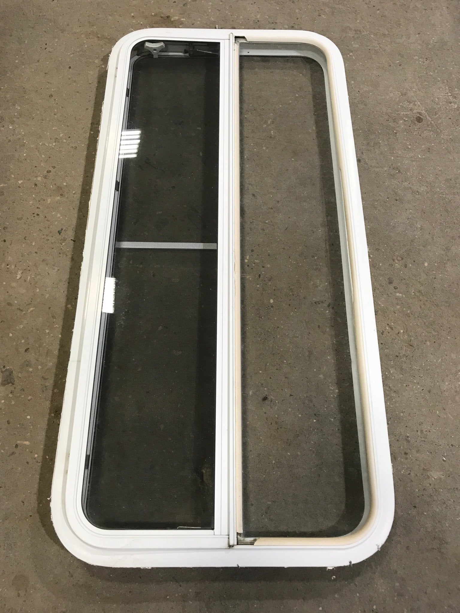 Used White Radius Emergency Opening Window : 47 1/2" W x 21 1/2" H x 1 1/2" D - Young Farts RV Parts