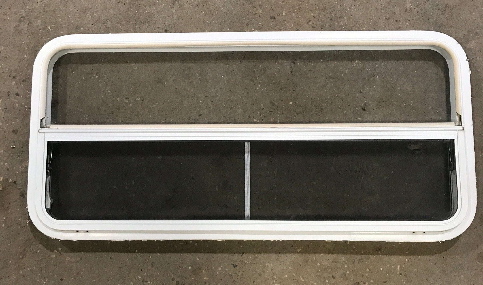 Used White Radius Emergency Opening Window : 47 1/2" W x 21 1/2" H x 1 1/2" D - Young Farts RV Parts