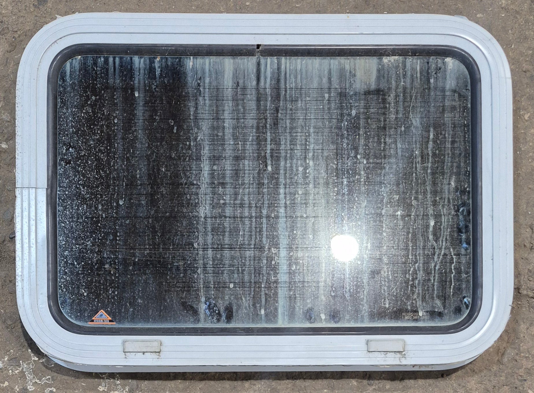 Used White Radius Non Opening Window : 24" W x 16 1/2" H x 1 7/8" D - Young Farts RV Parts