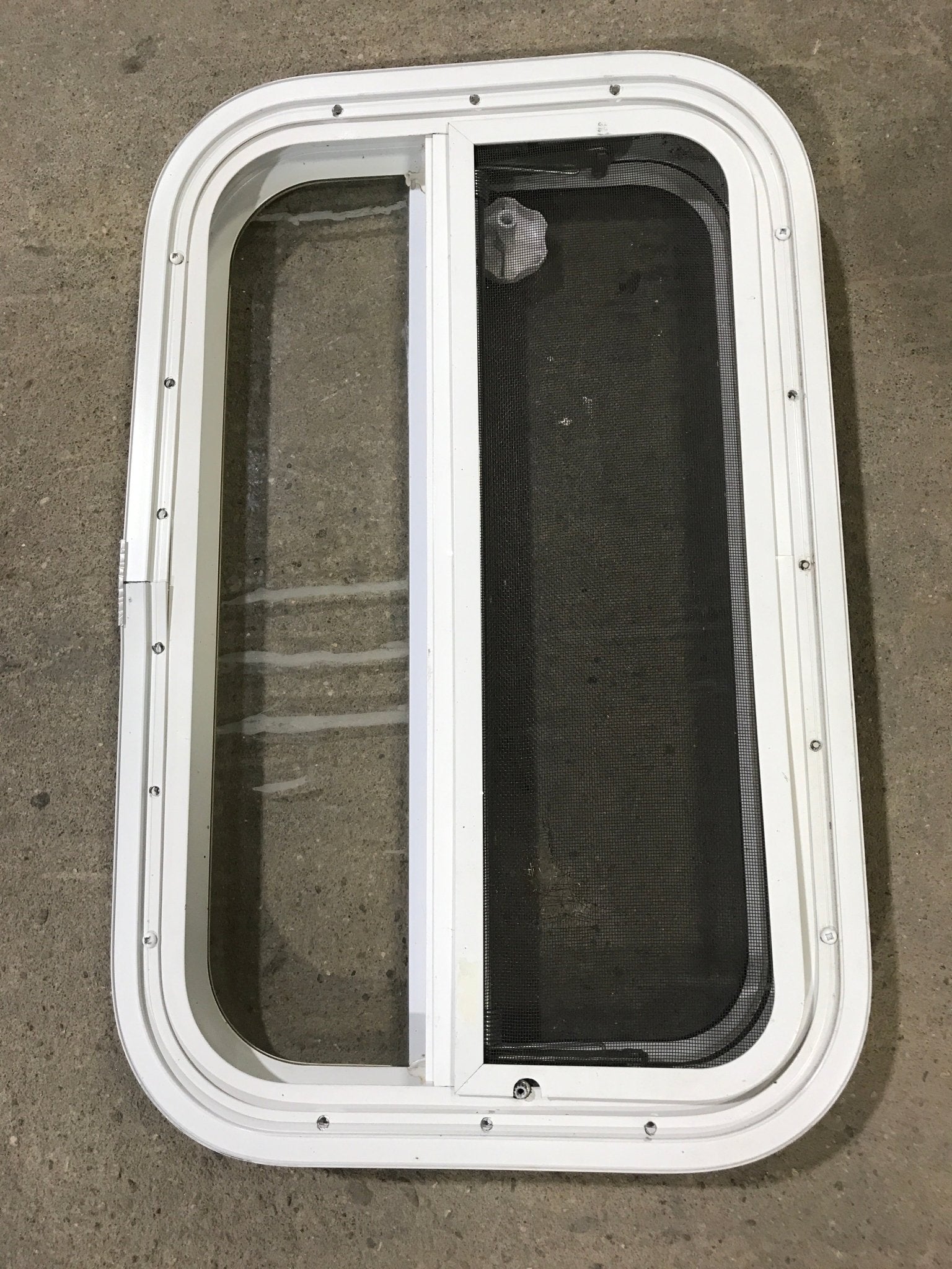 Used White Radius Opening Window : 23 1/4" W X 14 1/2" H X 1 1/2" D - Young Farts RV Parts
