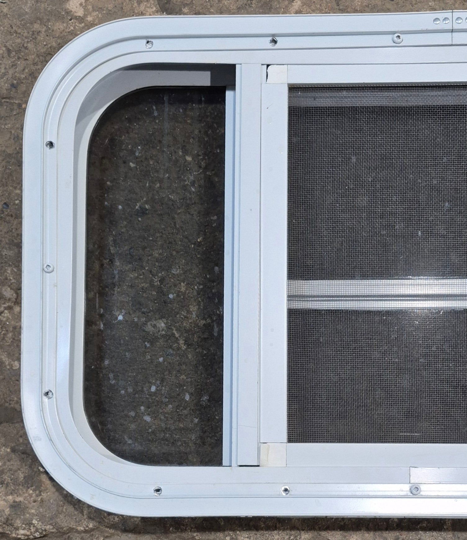 Used White Radius Opening Window : 23 1/4" W x 14 1/4" H x 1 7/8" D - Young Farts RV Parts
