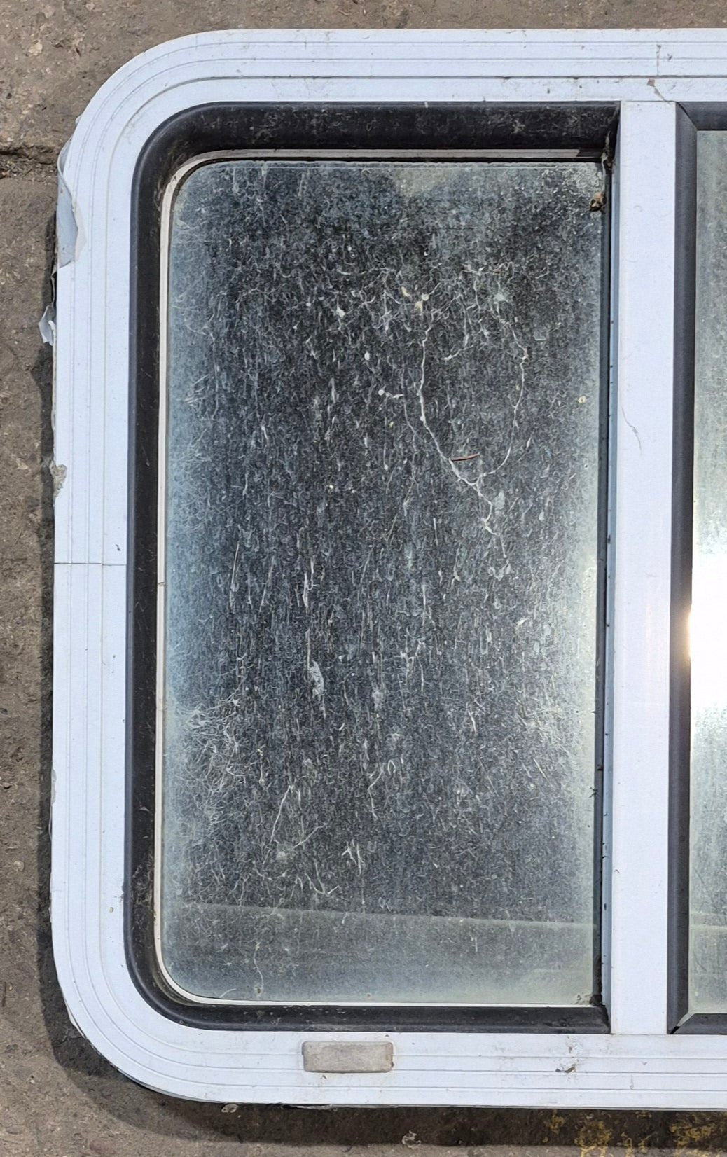 Used White Radius Opening Window : 24" W x 21 1/2" H x 1 7/8" D - Young Farts RV Parts