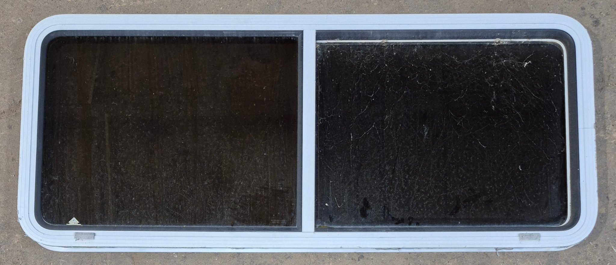 Used White Radius Opening Window : 54" W x 21 1/2" H x 1 7/8" D - Young Farts RV Parts