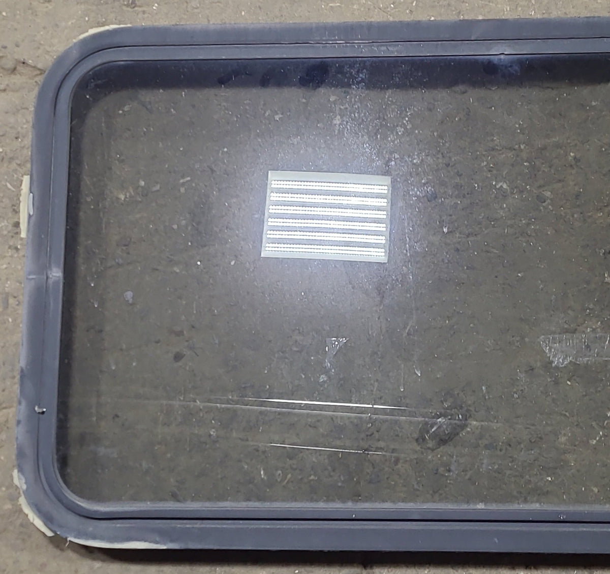 Used Black Radius Non-Opening Window : 25 1/2 X 23 1/2 X 2