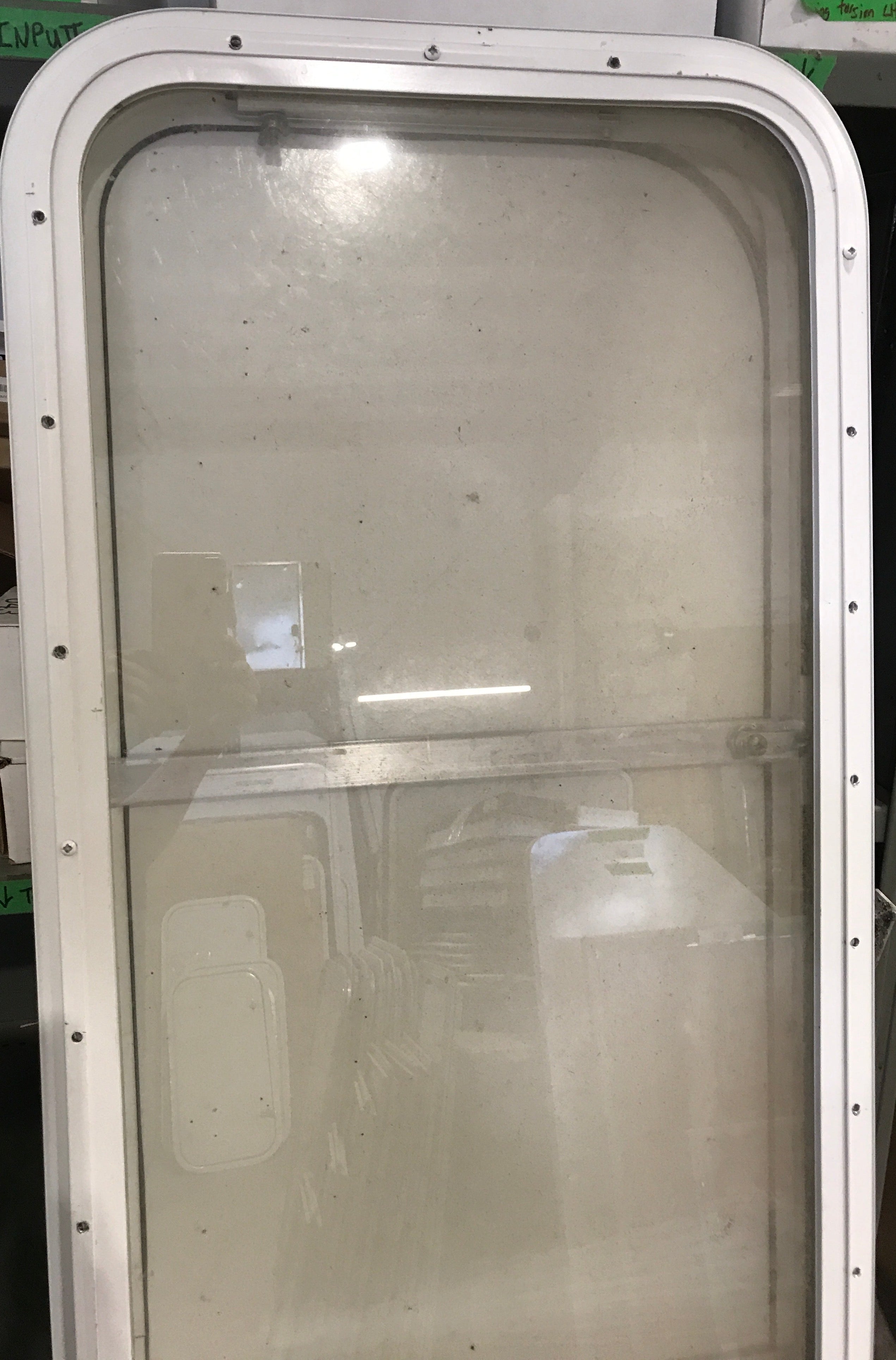 Used Radius Opening Rock Guard Covered Window: 59 1/2"  X 17 1/2"  X 1 1/2" D - Young Farts RV Parts