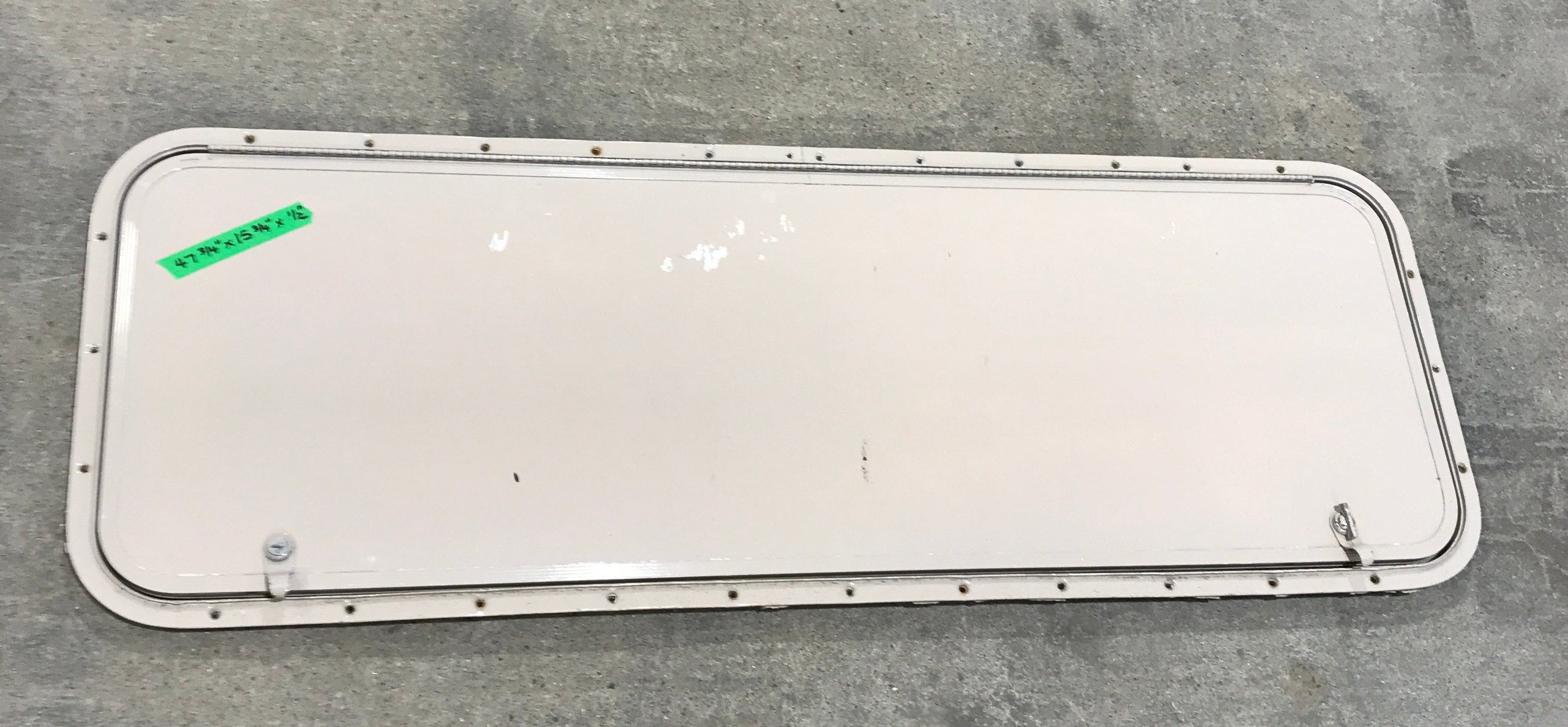 Used Radius Cornered Cargo Door 47 3/4" W x 15 3/5" H x 1/2" D