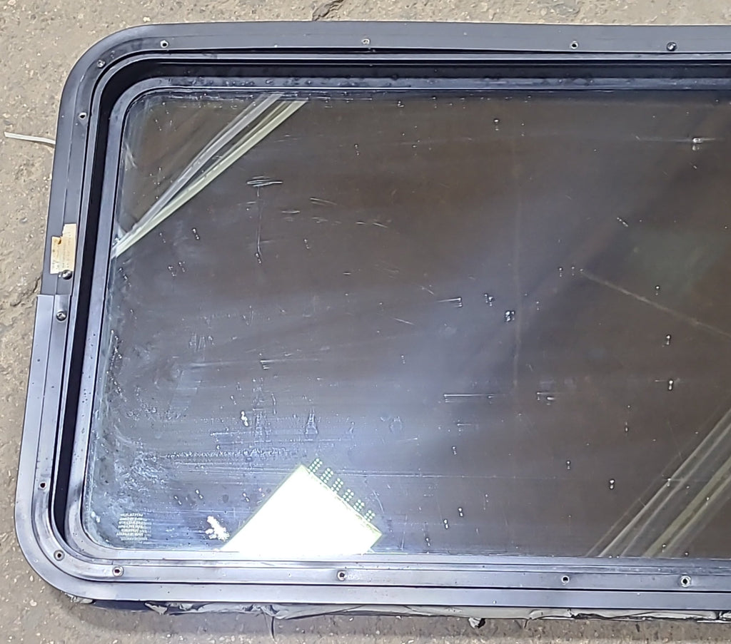 Used Black Radius Non Opening Window : 42 1/4" W x 21 1/2" H x 2" D - Young Farts RV Parts