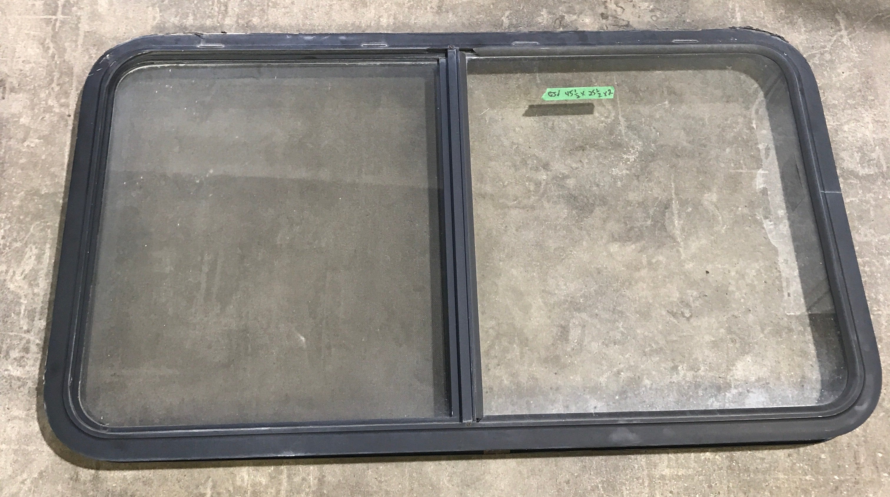 Used Black Radius Opening Window : 45 1/2" W x 25 1/2" H x 2" D