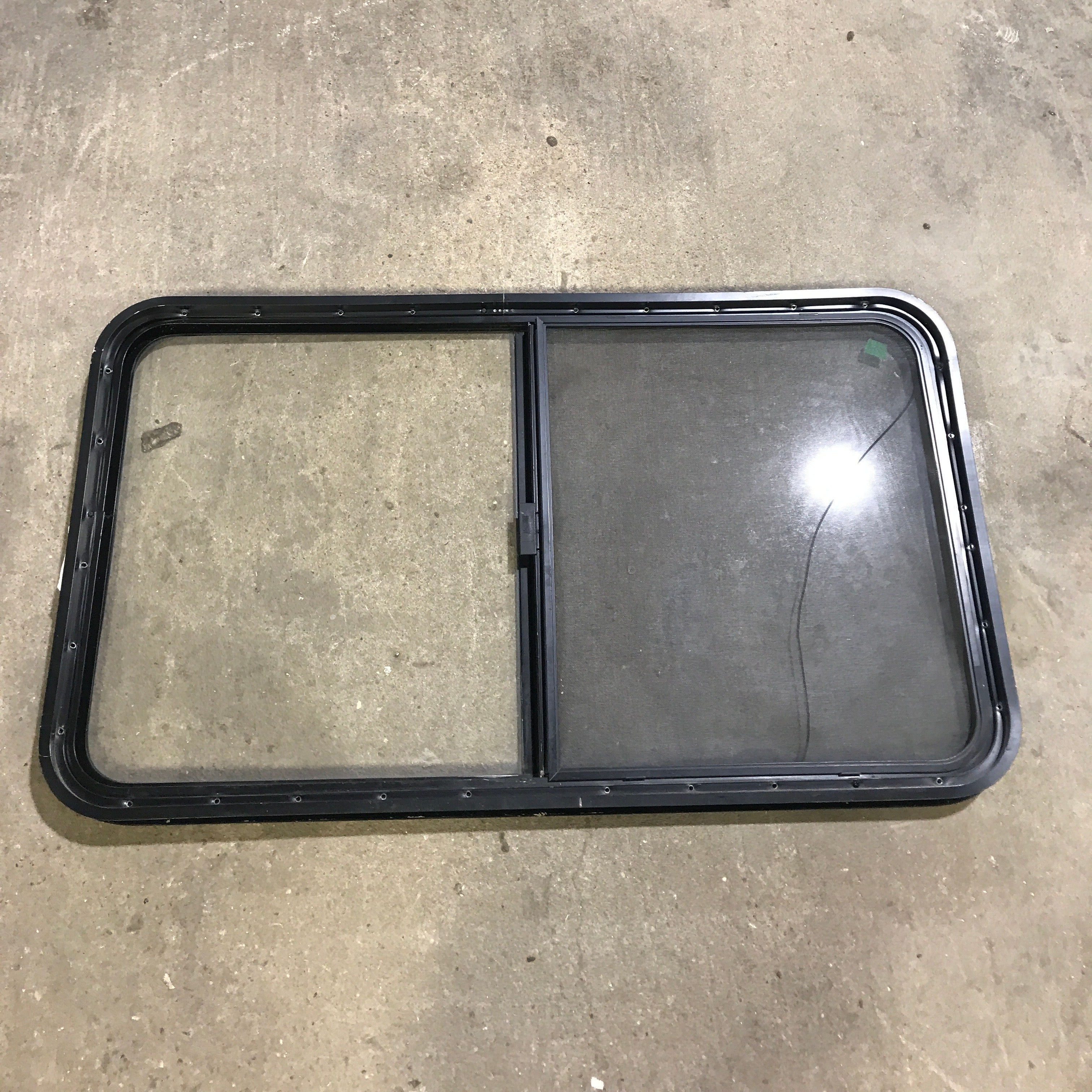 Used Black Radius Opening Window : 45.5" x 25.5" x 1.875" - Young Farts RV Parts
