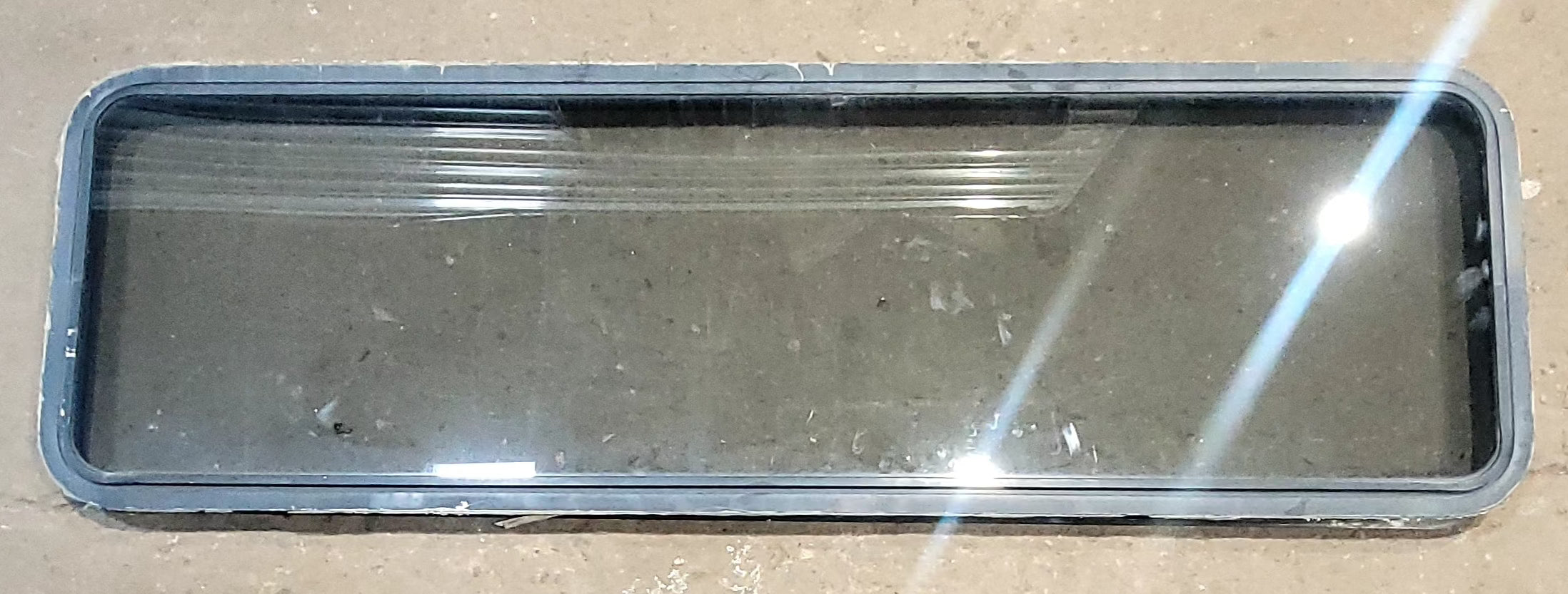 Used Black Radius Opening Window : 72" W x 21 3/4" H x 1 7/8" D - Young Farts RV Parts