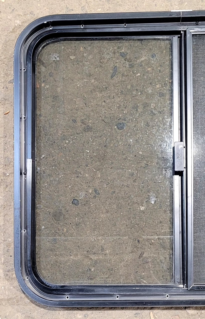 Used Black Radius Opening Window : 29 1/2" W x 25 1/2" H x 1 7/8" D - Young Farts RV Parts