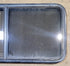 Used Black Radius Opening Window : 45 1/4" W x 21 1/2" H x 1 7/8" D - Young Farts RV Parts