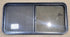 Used Black Radius Opening Window : 45 1/4" W x 21 1/2" H x 1 7/8" D - Young Farts RV Parts