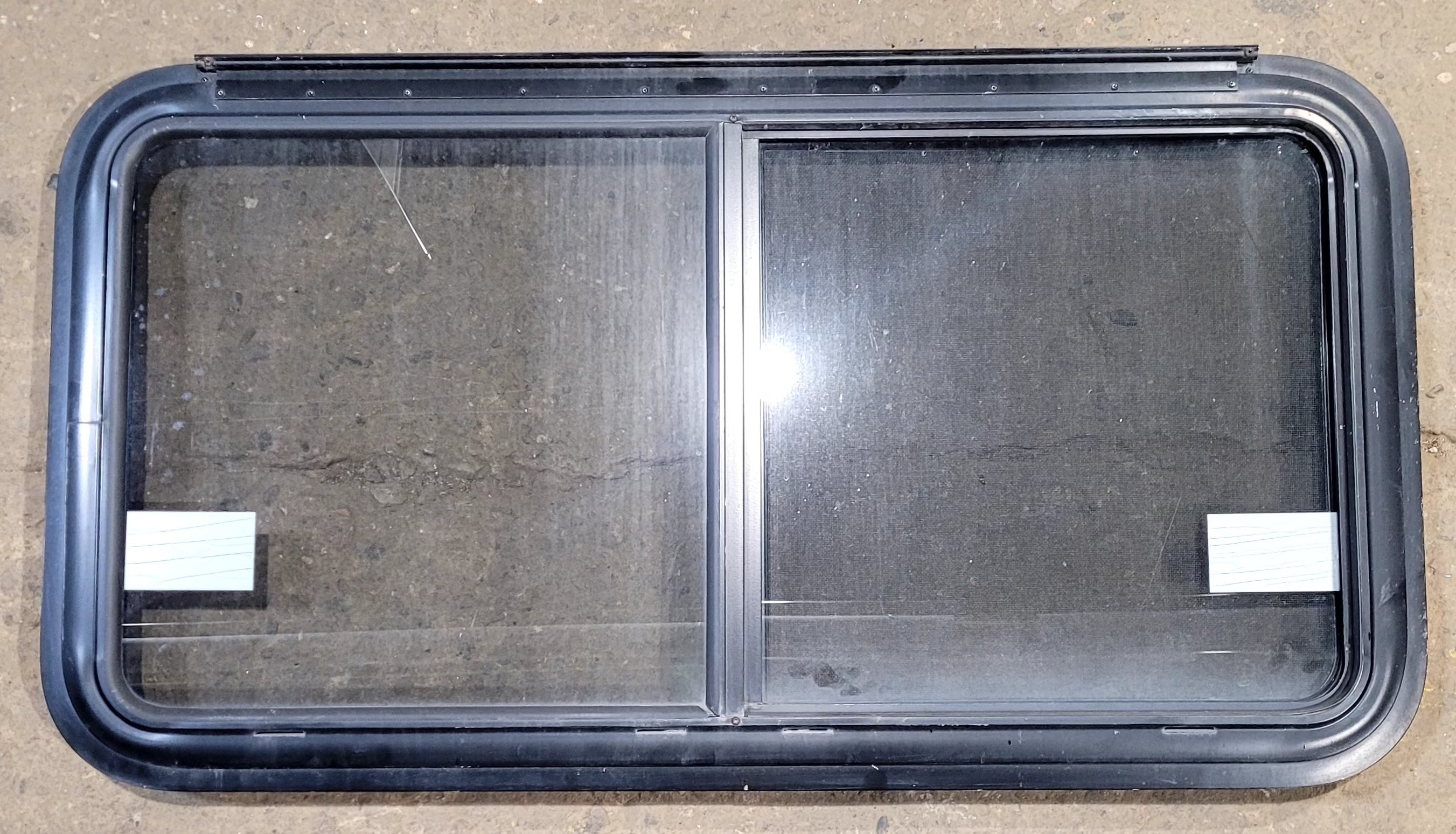 Used Black Radius Emergency Opening Window : 41 1/4" W x 21 1/2" H x 1 1/4" D