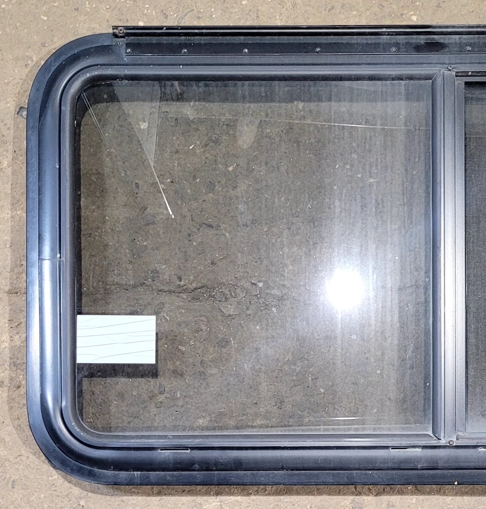 Used Black Radius Emergency Opening Window : 41 1/4" W x 21 1/2" H x 1 1/4" D