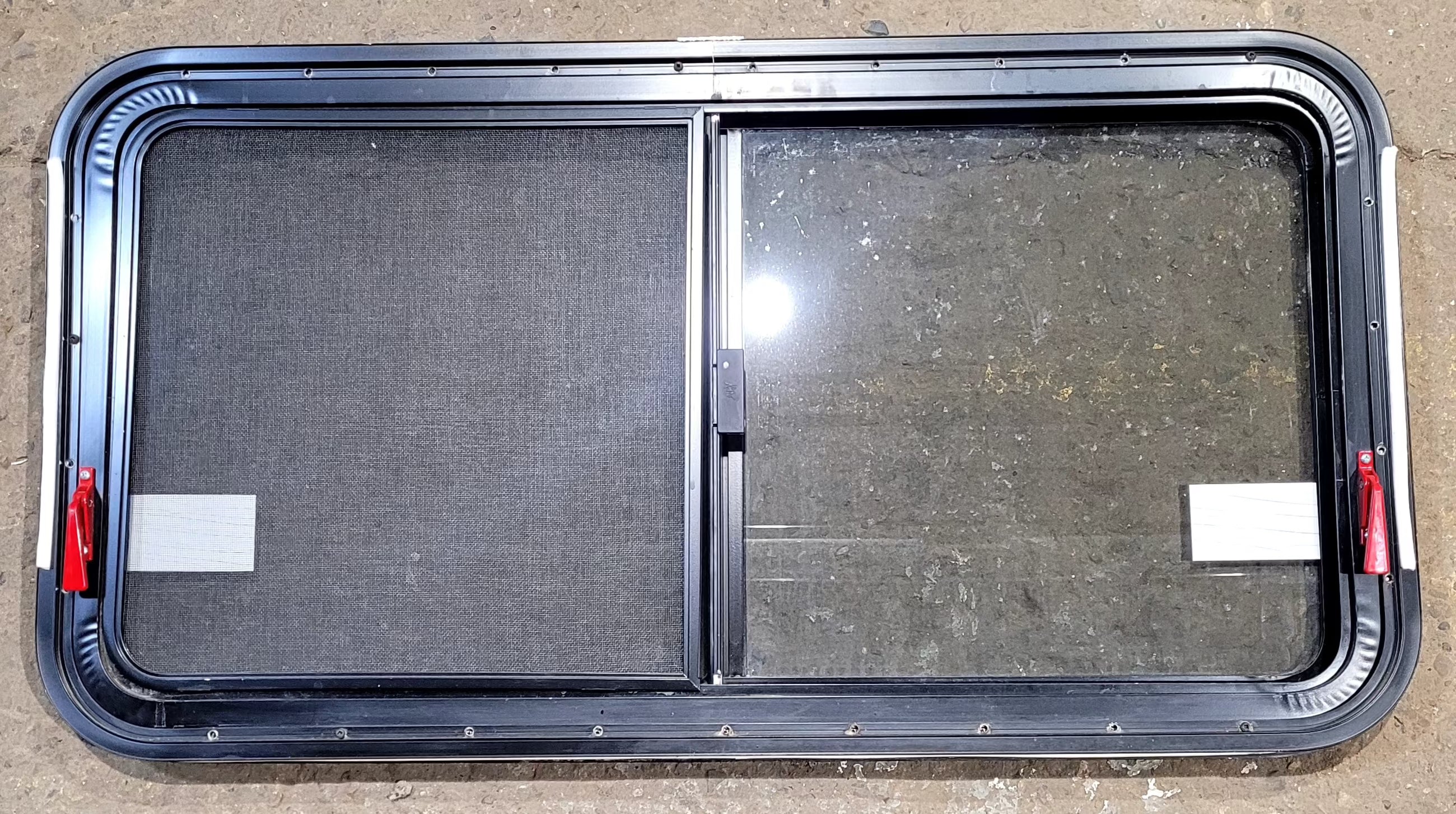 Used Black Radius Emergency Opening Window : 41 1/4" W x 21 1/2" H x 1 1/4" D