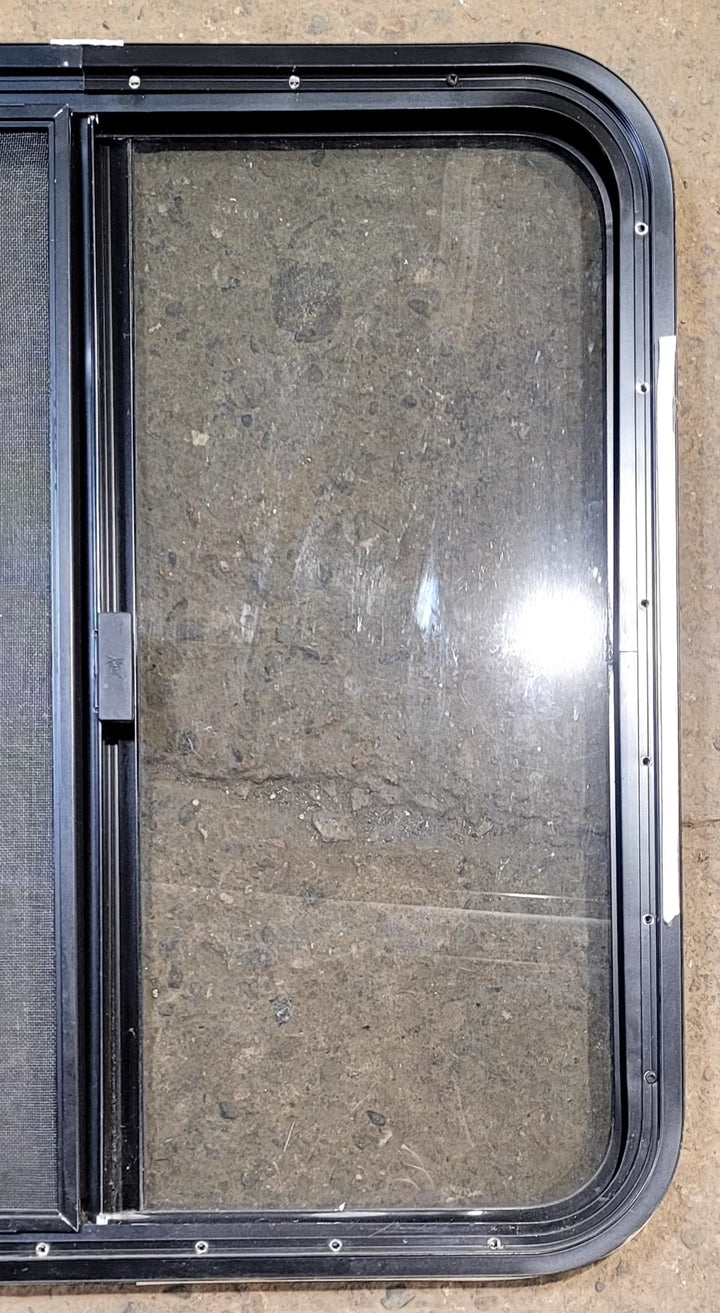 Used Black Radius Opening Window : 29 1/4" W x 27 1/4" H x 1 1/4" D - Young Farts RV Parts