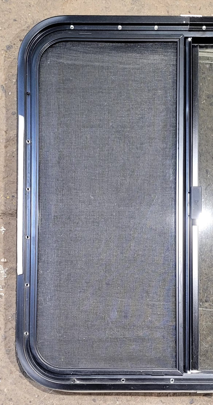 Used Black Radius Opening Window : 29 1/4" W x 27 1/4" H x 1 1/4" D - Young Farts RV Parts