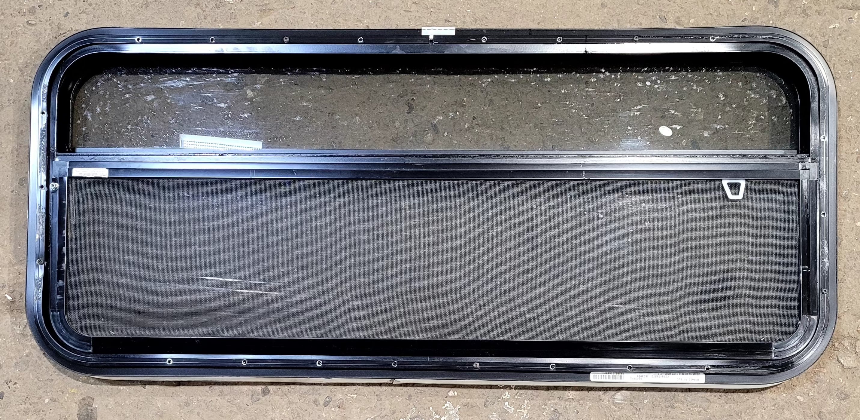 Used Black Radius Opening Window : 41 1/4" W x 17 1/4" H x 1 1/8" D