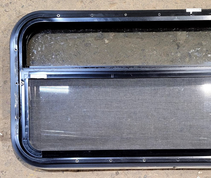 Used Black Radius Opening Window : 41 1/4" W x 17 1/4" H x 1 1/8" D - Young Farts RV Parts